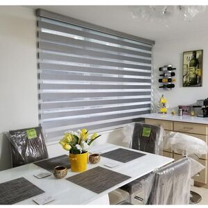 Bright kitchen in Bangladesh with zebra blinds that filter sunlight, keep the space cool, and add a clean modern touch.